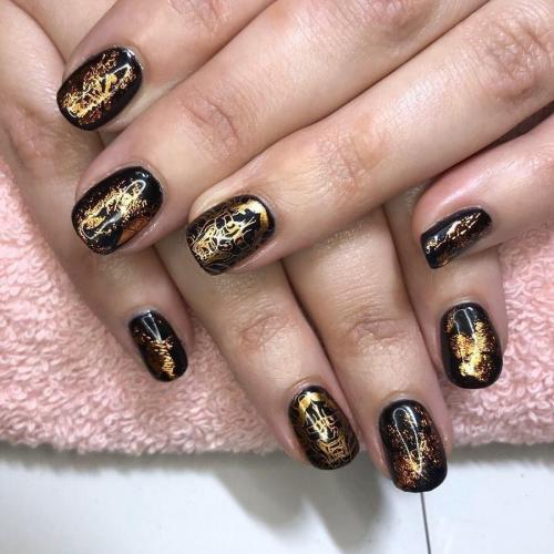 Black and Gold Metallic Nails